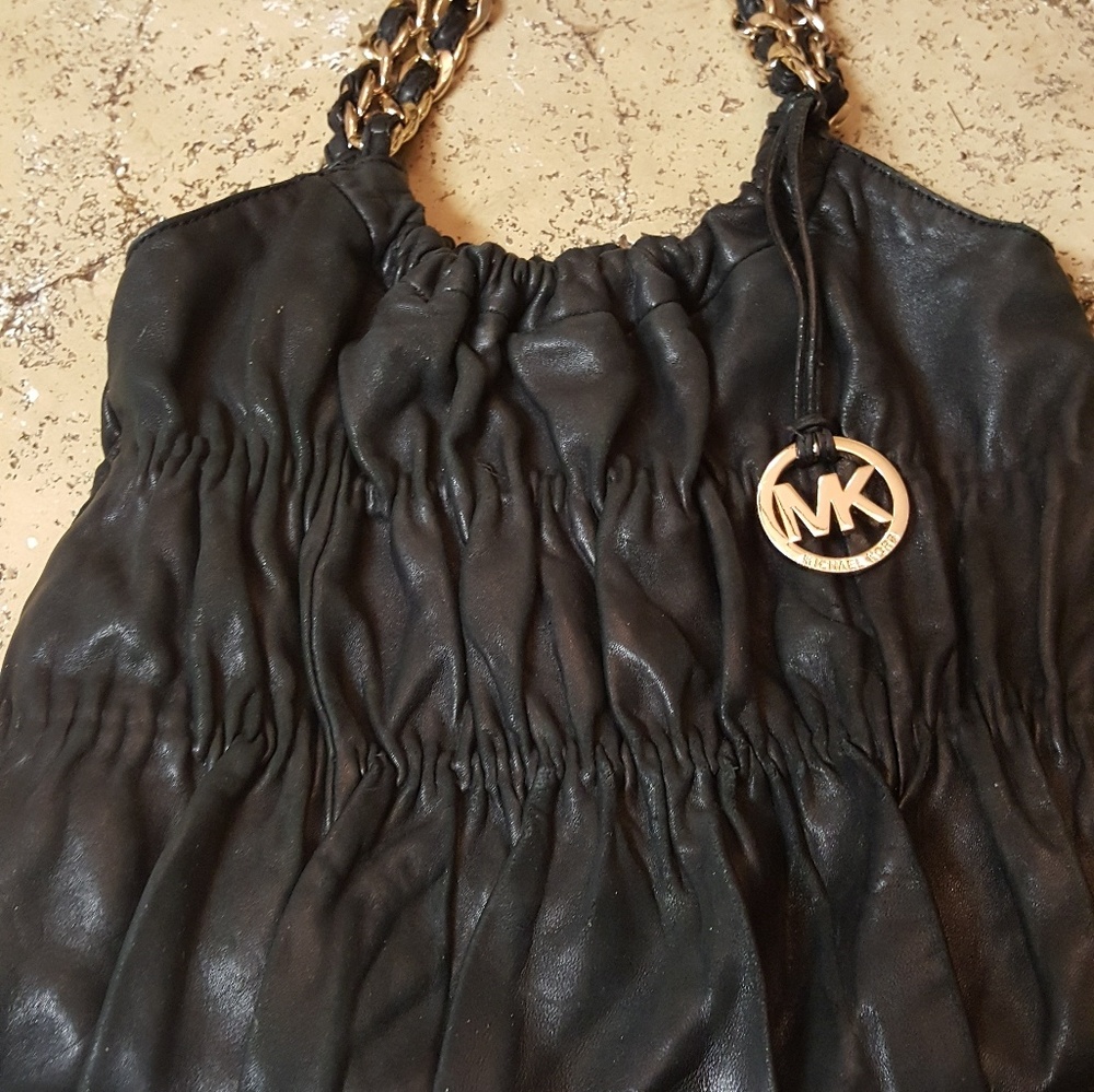 Michael Kors black leather purse.
